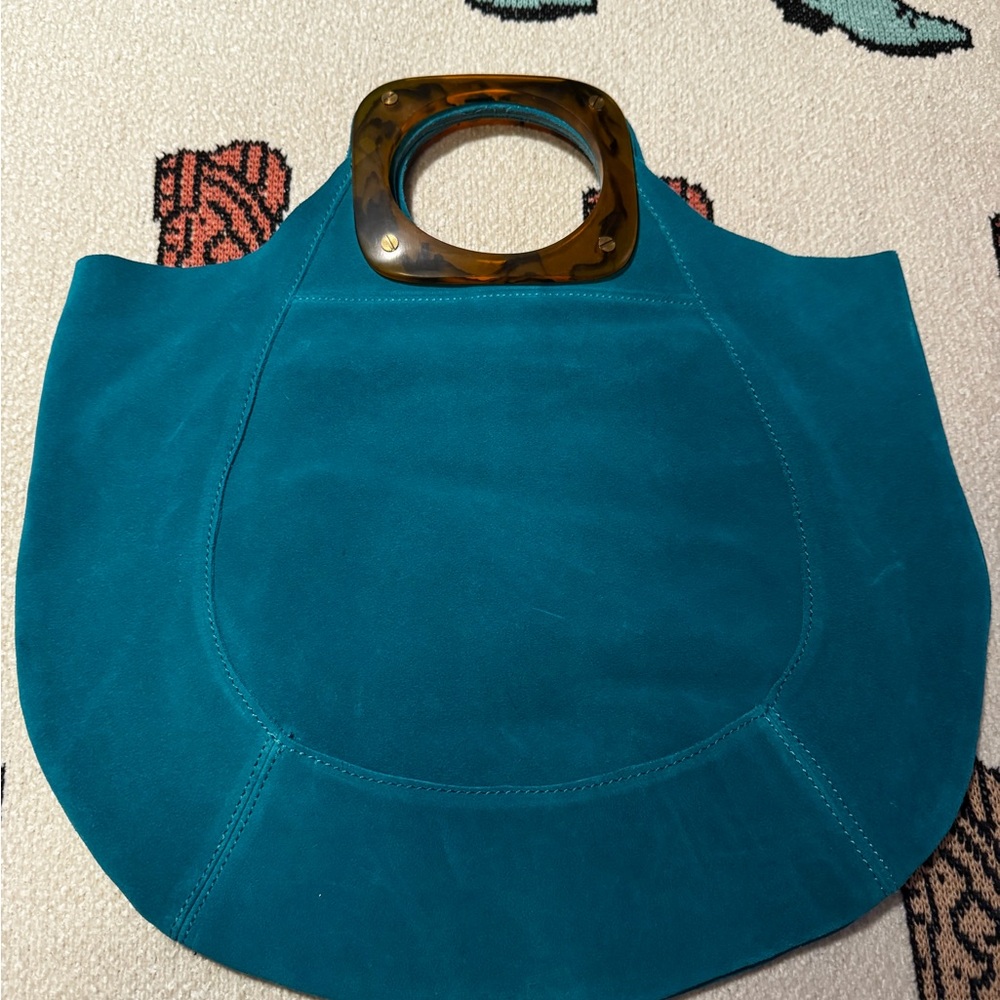 Anthropologie teal Blue suede Clutch bag with tortoiseshell Handles.